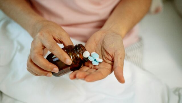 Bottle of blue pills