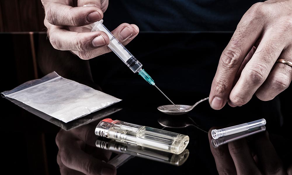 When someone "shoots the cottons" (re-injecting drugs from previously used cotton filters), they significantly increase their risk of developing this condition.