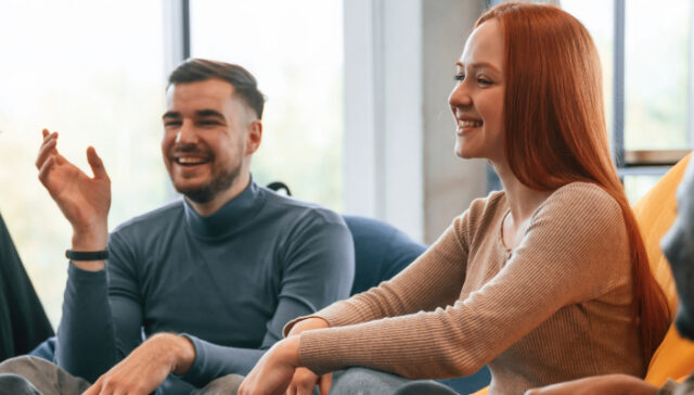 Diverse group in a supportive PHP therapy session at A2C during a structured first week of treatment